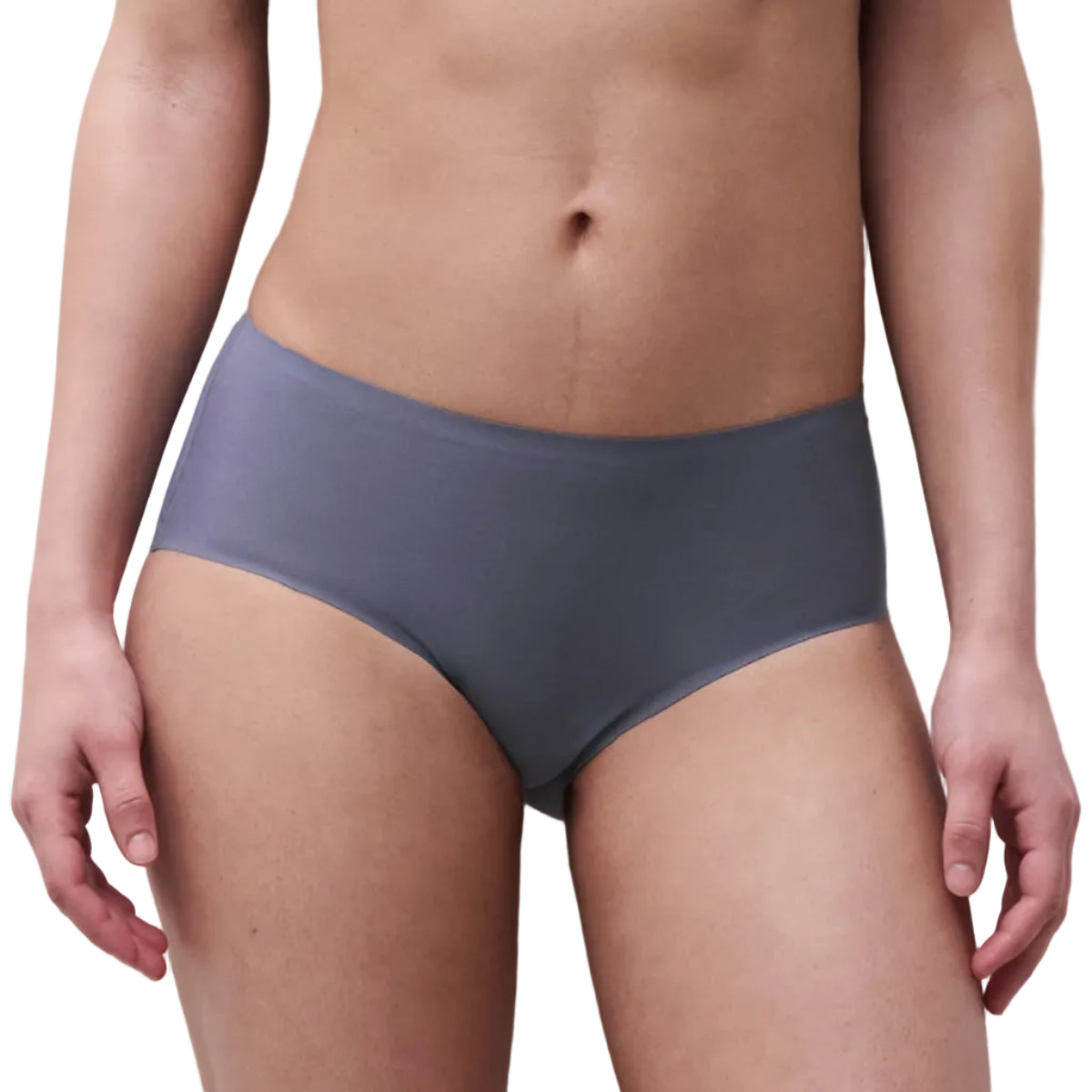 A close-up of a model wearing high-waisted, low-rise briefs in a muted slate gray color.