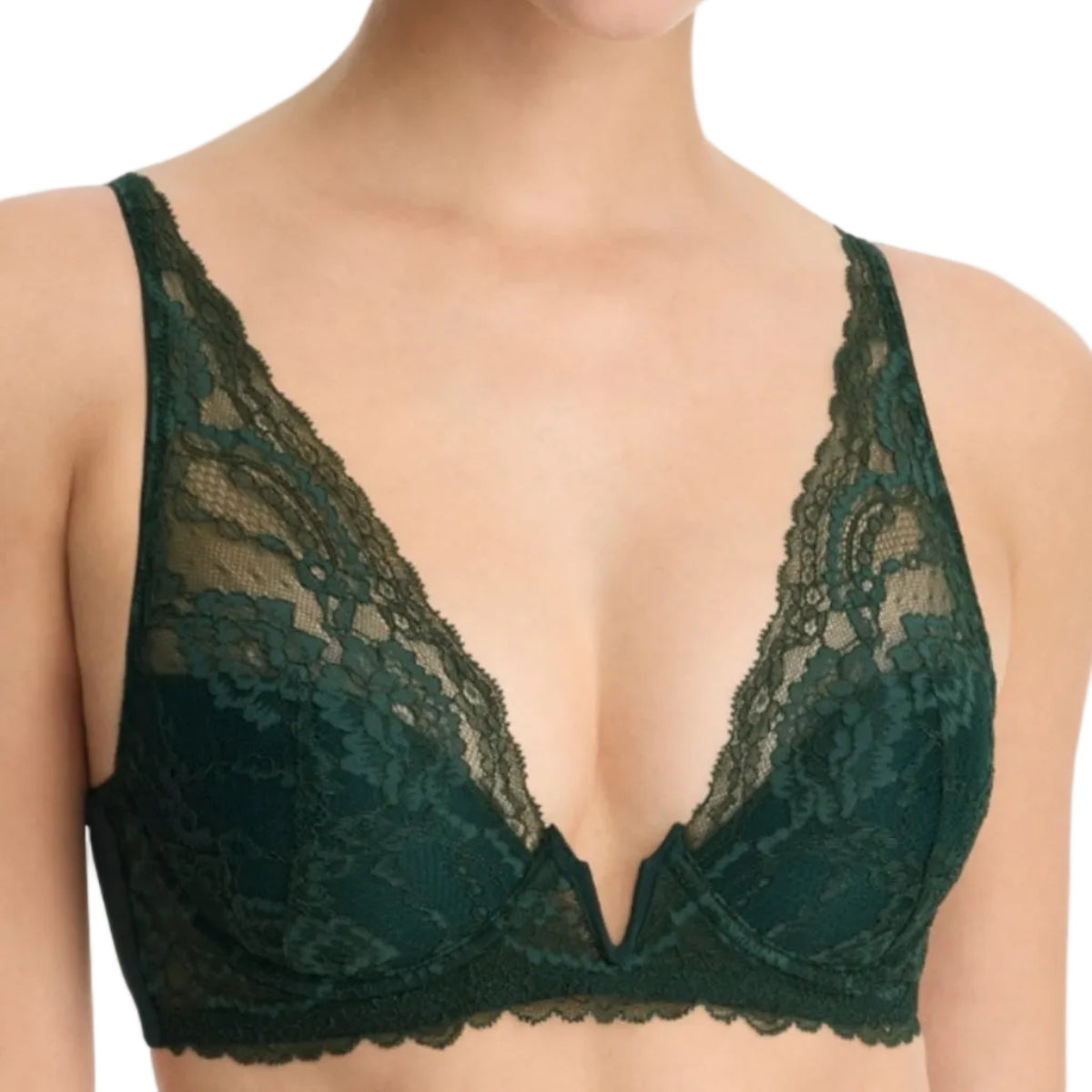 A close-up of a model wearing a dark forest green lace bra with scalloped edges and underwire, shown against a plain white background.