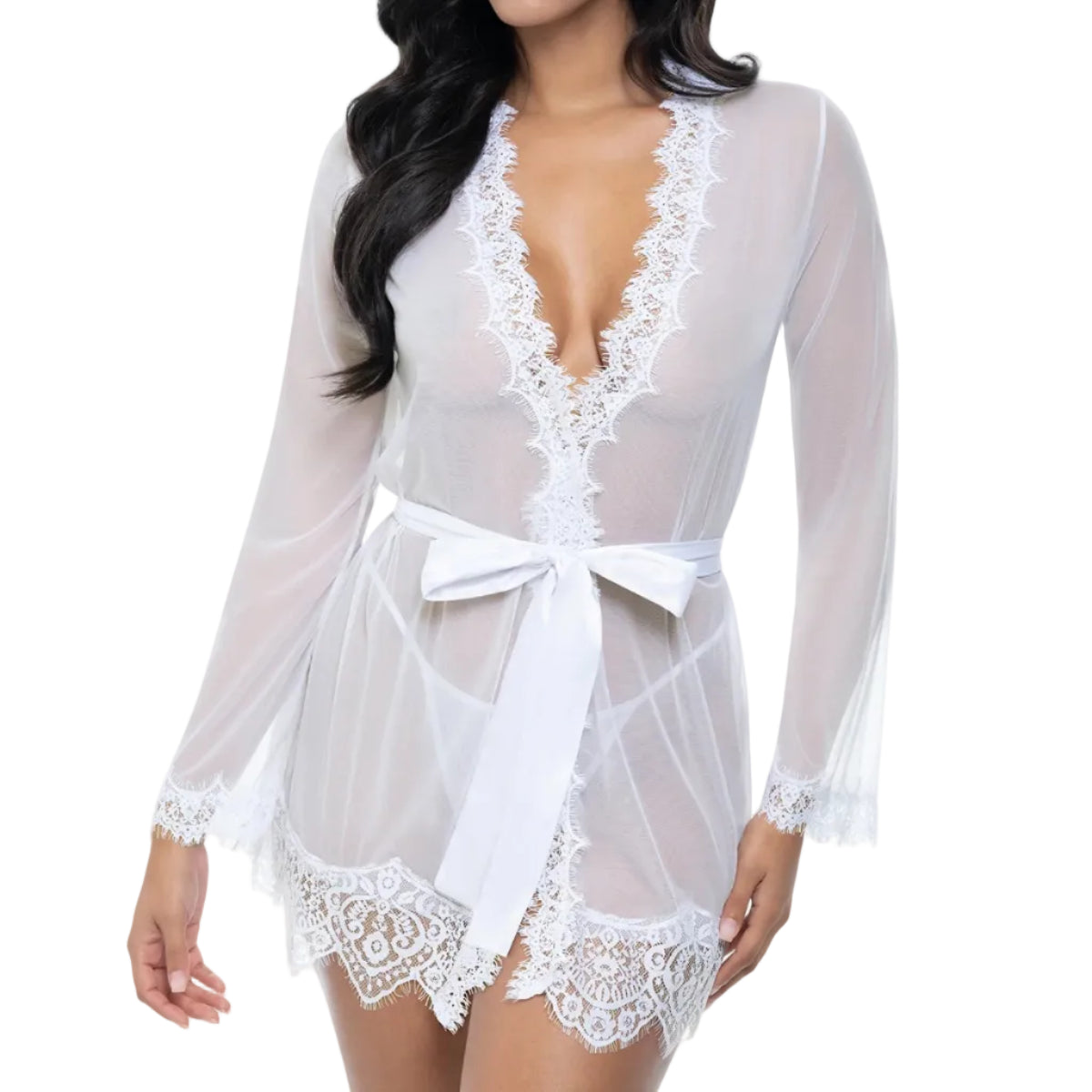 Woman wearing a white lace lingerie set with a bow on a white background