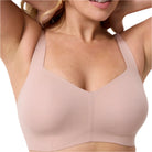 Model wearing Evelyn Bobbie Beyond Bra in Petal Drift Pink Close View