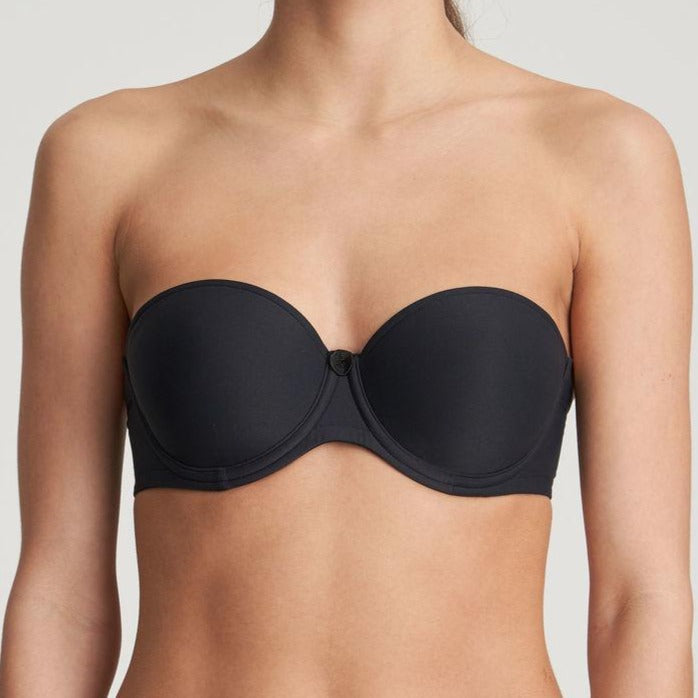 Tom strapless bra with seamless bandeau cup. The straight back has a wider elastic band that, in combination with the fabric, provides additional support. It can be worn strapless, halter neck or as a regular bra. Graphite is a soft dark-grey hue and a great alternative to black. Style: 0120828CHB 