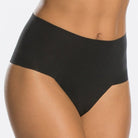 Elastic-free edges and a bonded waistband make these next-to-nothing panties truly Undie-tectable Thong by Spanx.