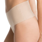 Elastic-free edges and a bonded waistband make these next-to-nothing panties truly Undie-tectable Thong by Spanx.