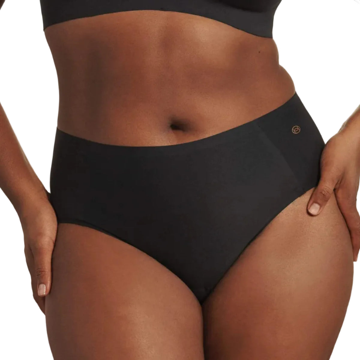 High-waisted black seamless underwear with a visible brand tag on the side.