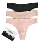 Three pairs of Spanx underwear in black, beige, and pink on a white background.