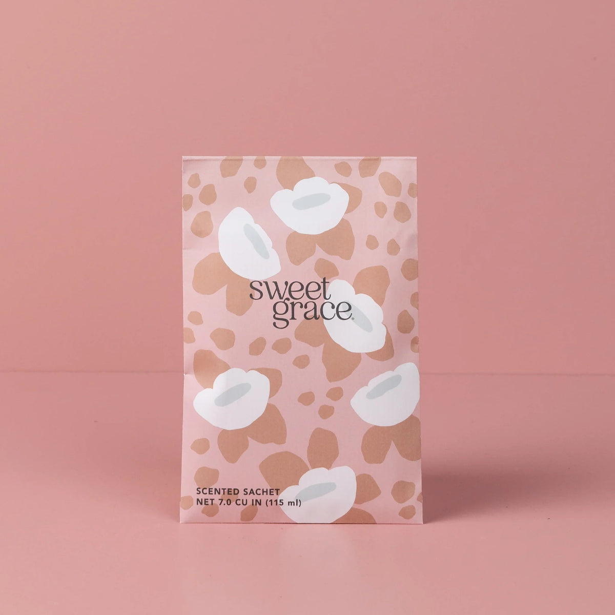 Scented sachet packaging with 'sweet grace' branding on a pink background