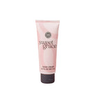 Tube of Sweet Grace hand cream on a pink background