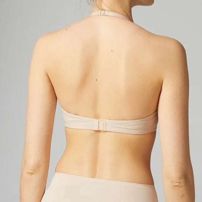 •	Unlined light beige t-shirt bra with underwire.This sleek, soft microfiber bra molds to your body and disappears under your clothes. it feels like a second skin and hugs your curves for a smooth, natural shape. Multi-position straps can be worn 3 ways:  halter shown in this example