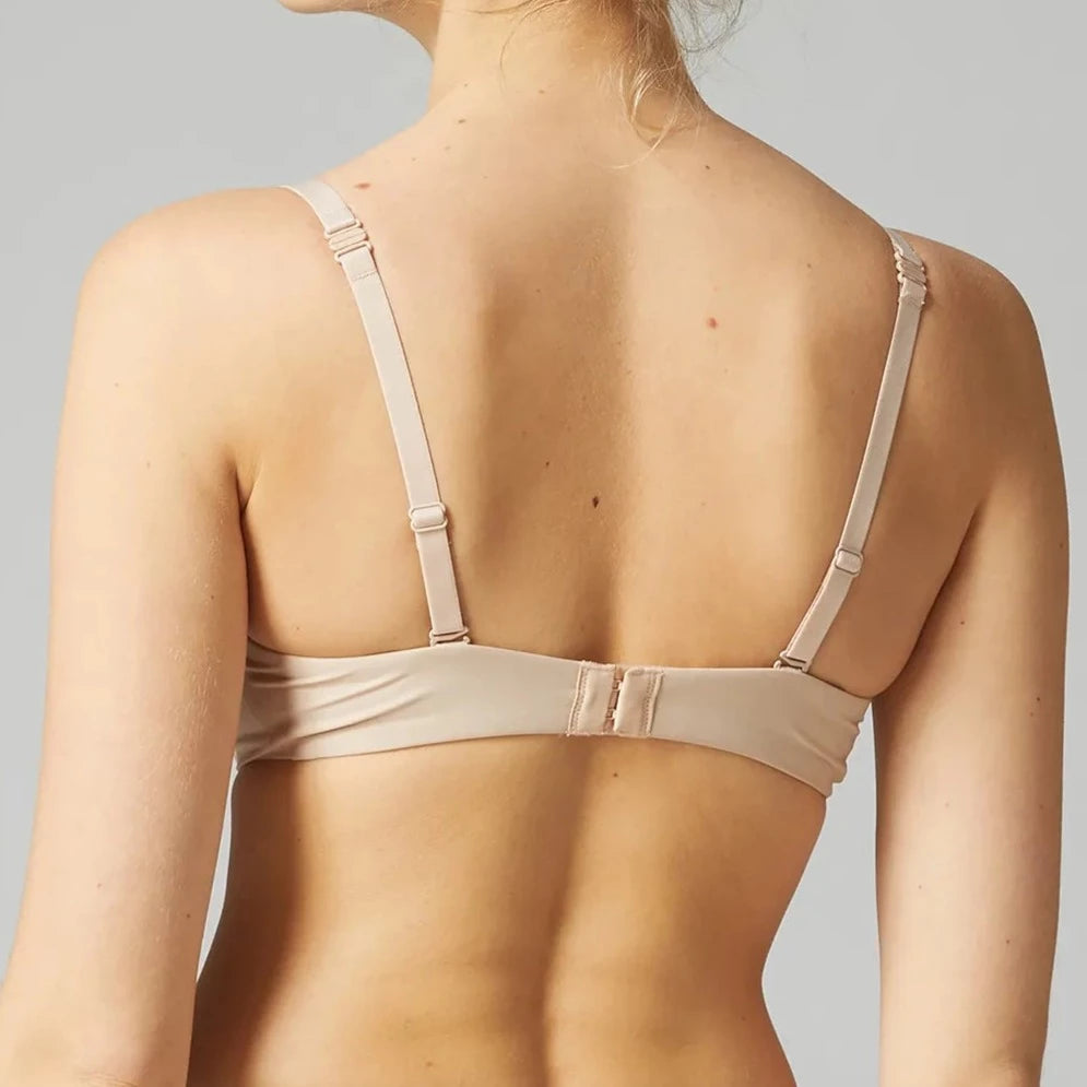  •	Unlined light beige t-shirt bra with underwire.This sleek, soft microfiber bra molds to your body and disappears under your clothes. it feels like a second skin and hugs your curves for a smooth, natural shape. Multi-position straps can be worn 3 ways: classic shown in this example