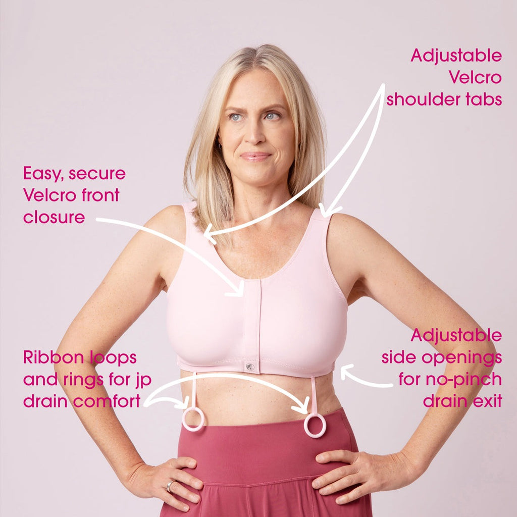 Pink post surgery bra. Adjustable Velcro shoulder tabs, Velcro front closure, ribbon loops and rings for jp drain comfort, adjustable side openings for no-pinch drain exit. 