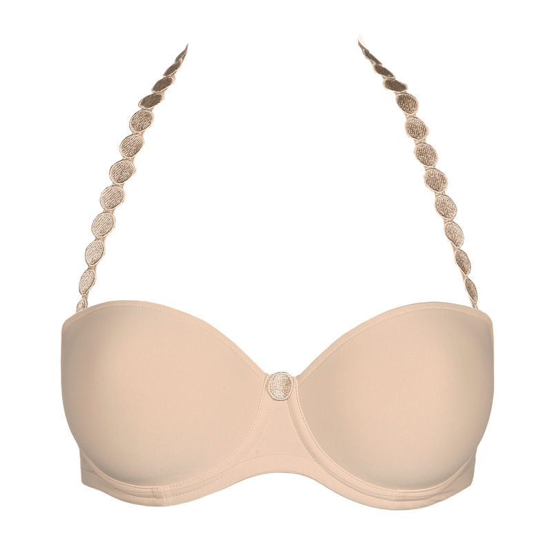 Tom strapless bra with seamless bandeau cup. The straight back has a wider elastic band that, in combination with the fabric, provides additional support. It can be worn strapless, halter neck or as a regular bra. Café Latte is a delicate neutral and a must-have in every lingerie drawer. Style: 0120828CAL 