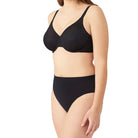 Wacoal 855303 Back Appeal Underwire Bra in Black •	Back and side smoothing underwire bra •	Supportive cups covered with pretty dot jacquard fabric with accent sheen •	Hidden sling in cups for added support •	Microthin spacer fabric band designed to minimize back and side bulge concealed with pretty dot jacquard fabric •	Fully adjustable straps with matching dot detail •	Hook-and-eye back closure